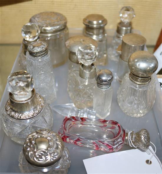 13 silver topped scent bottles